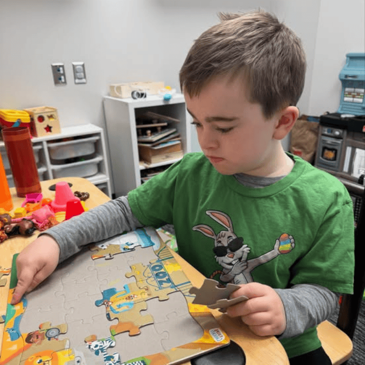 Child playing during Speech Therapy Session Child playing during Speech Therapy Session