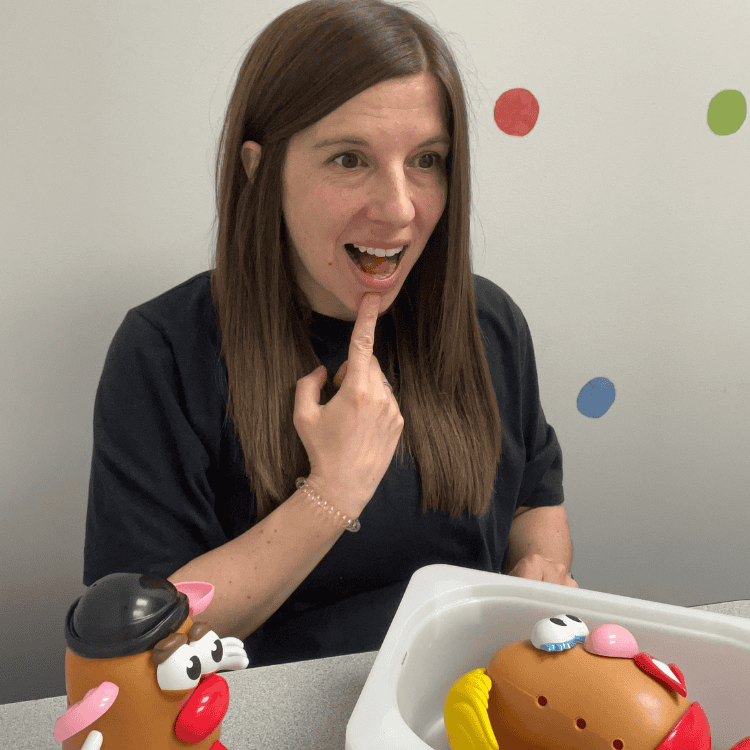 Speech Therapist working with a child showing sounds Speech Therapist working with a child showing sounds