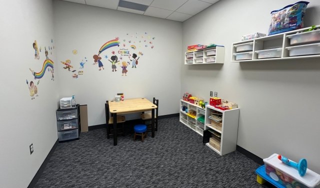 Warm inviting therapy room for speech and occupational therapy